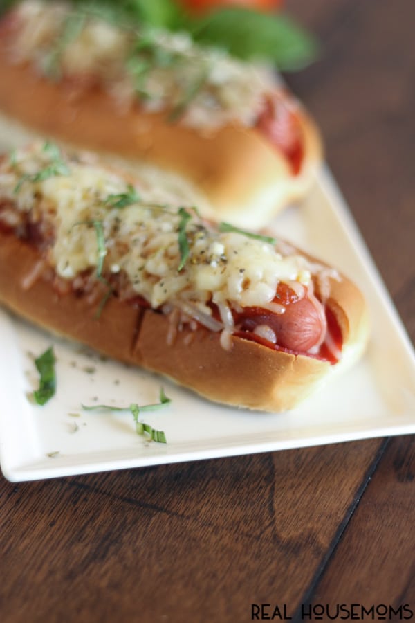 PIZZA HOT DOGS take on a fun new flavor featuring pepperoni, sauce, and gooey cheese for the ultimate kid-pleasing meal!