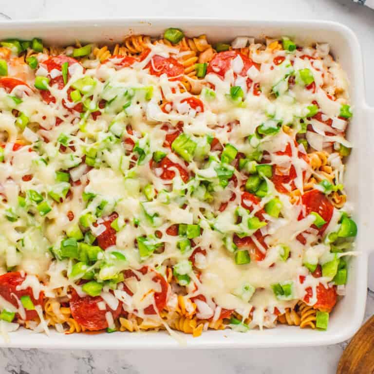 square image of pizza pasta bake in the baking dish