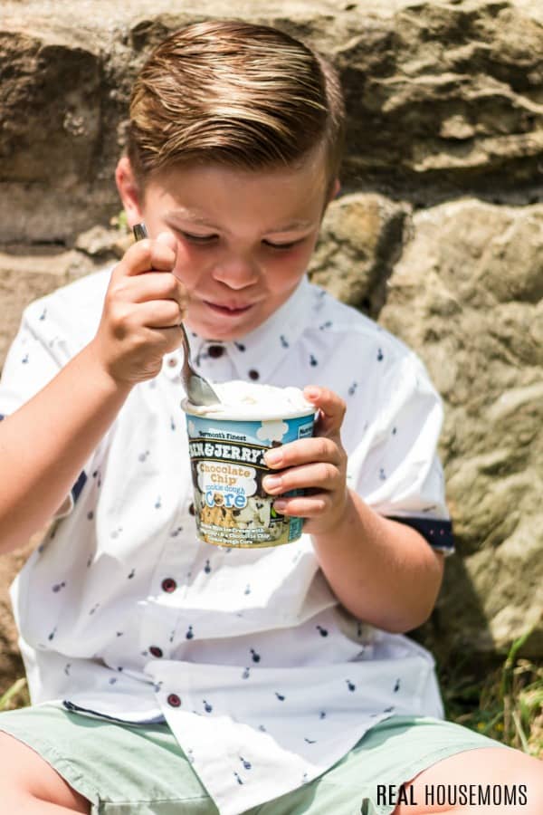 boy eating Ben & Jerry's ice cream from a carton