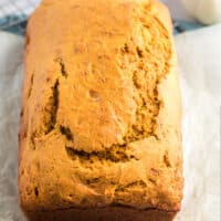 square image of a loaf of pumpkin banana bread