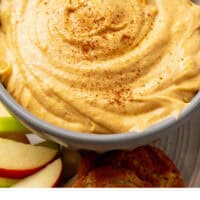 pumpkin mousse dip in a bowl with recipe name at the bottom