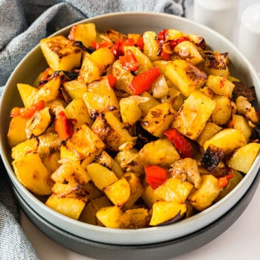 square image of quick and easy roasted potatoes in a serving bowl