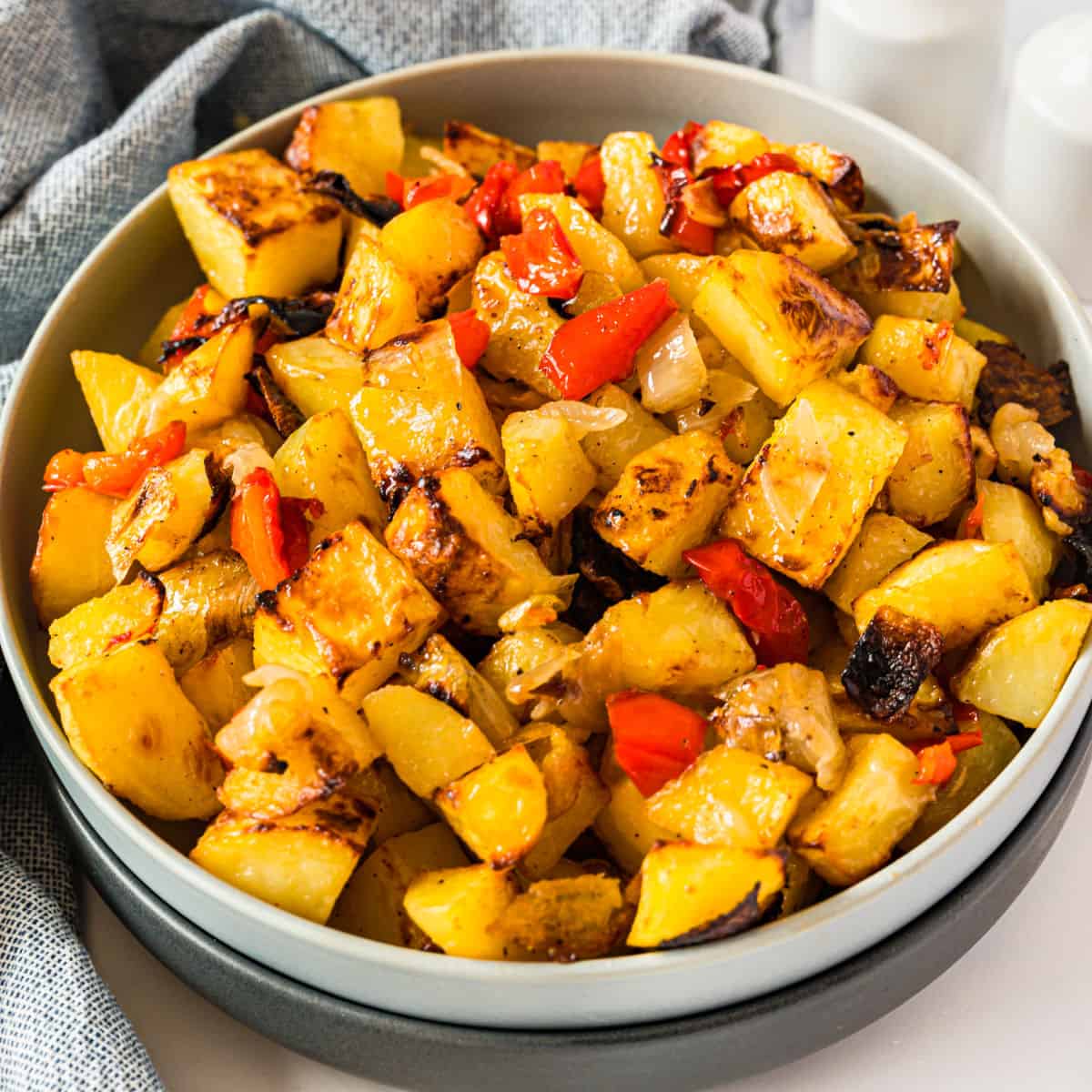 square image of quick and easy roasted potatoes in a serving bowl