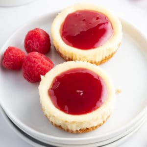 Raspberry Cheesecake Bites are the perfect bite-sized treat for Valentine's day or any occasion! These little desserts are super simple and oh-so-scrumptious!