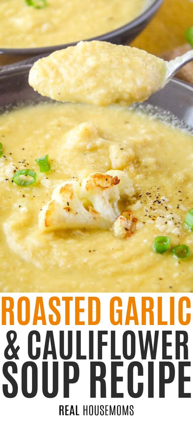 Image of Roasted Garlic Cauliflower Soup in a grey bowl with a spoon full of soup in the center