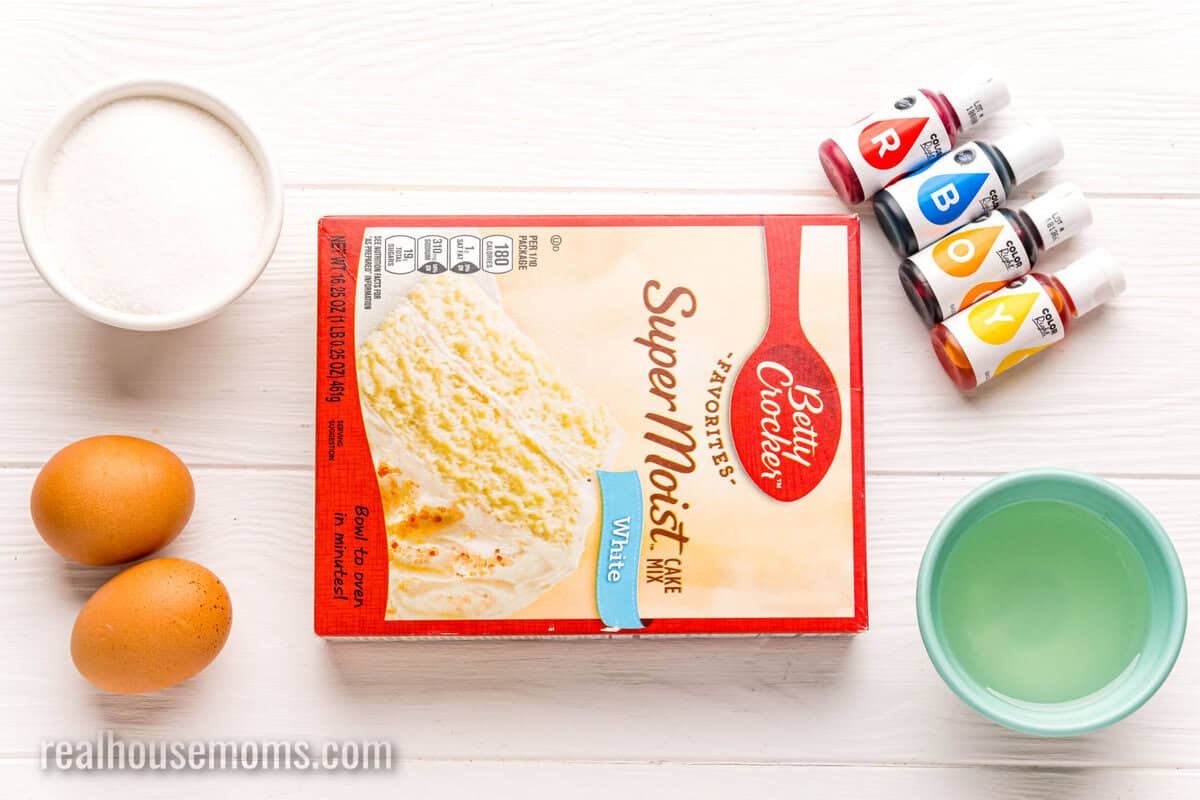 ingredients to make rainbow cake mix cookies laid out on a counter