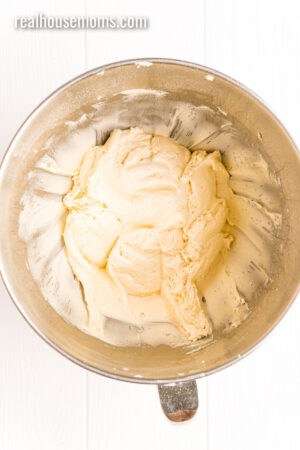 vanilla cake mix cookie dough in a stand mixer bowl