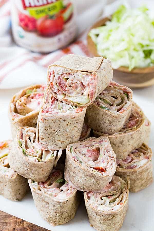 Ranch BLT Roll Ups are a hit at every party! Bacon, lettuce and tomato are even better with ranch dressing and cream cheese! These are perfect for game day!