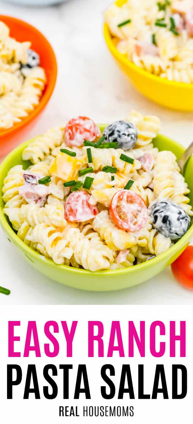 ranch pasta salad in a bowl next to other bowls of pasta salad