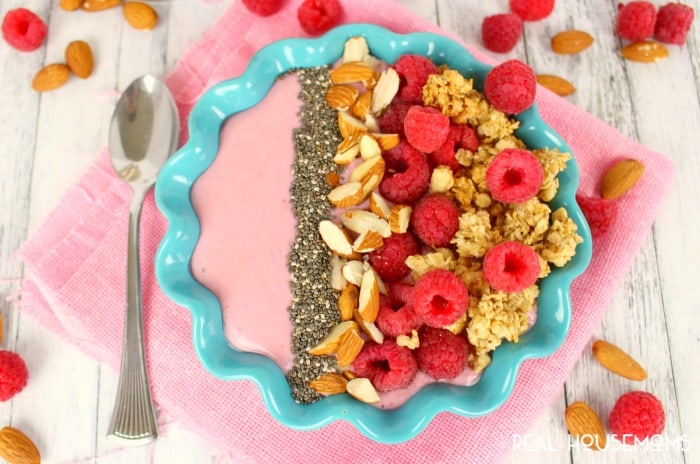 Loaded with protein and packed with flavor, this RASPBERRY ALMOND SMOOTHIE BOWL is s quick and easy breakfast is just as healthy as it is delicious!