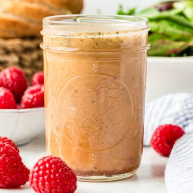 square image of a mason jar of raspberry balsamic vinaigrette