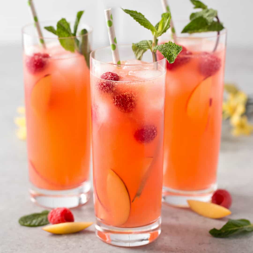 This Peach Raspberry Lemonade is a fresh, bright, and deliciously sweet. It's the perfect way to sip your troubles away!