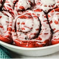 pan of red velvet sweet rolls with recipe name at the bottom