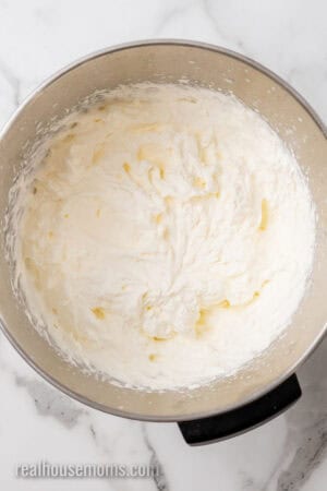 whipped cream in a metal bowl