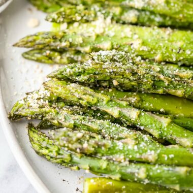 Roasted Asparagus is simple, easy, and a fresh, delicious side dish that will brighten all of your Spring and Summer meals!