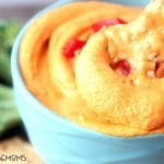 You'll never buy hummus again after you try this homemade ROASTED RED PEPPER HUMMUS! It is creamy and flavorful and tastes amazing with a handful of vegetables, pita chips, or pretzels.