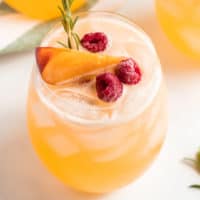 square image of rosemary peach tequila punch