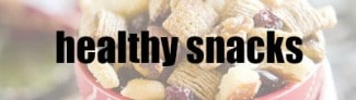 Close up of mixed cereal snack in bowl with healthy snacks text overlay