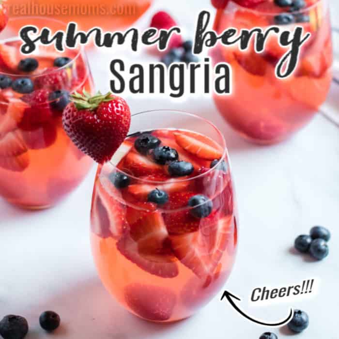 square image of summer berry sangria, pic of several glasses filled with berries and sangria 