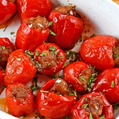 Sausage Stuffed Cherry Peppers are an easy and tasty appetizer that can be prepared ahead of time and popped in the oven ready to serve!