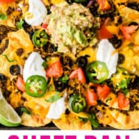 sheet pan nachos topped with sour cream and guacamole with recipe name at bottom