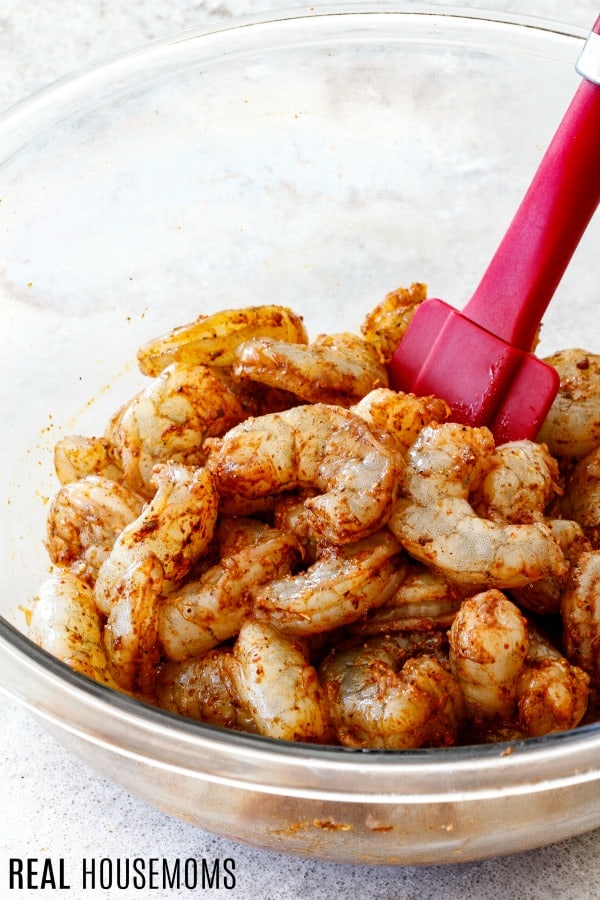 shrimp in a bowl coated with fajita seasoning