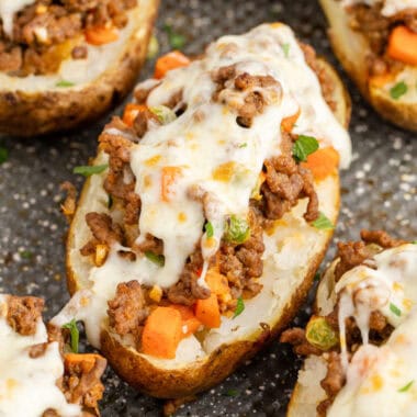 square image of shepherd's pie baked potato on a baking sheet