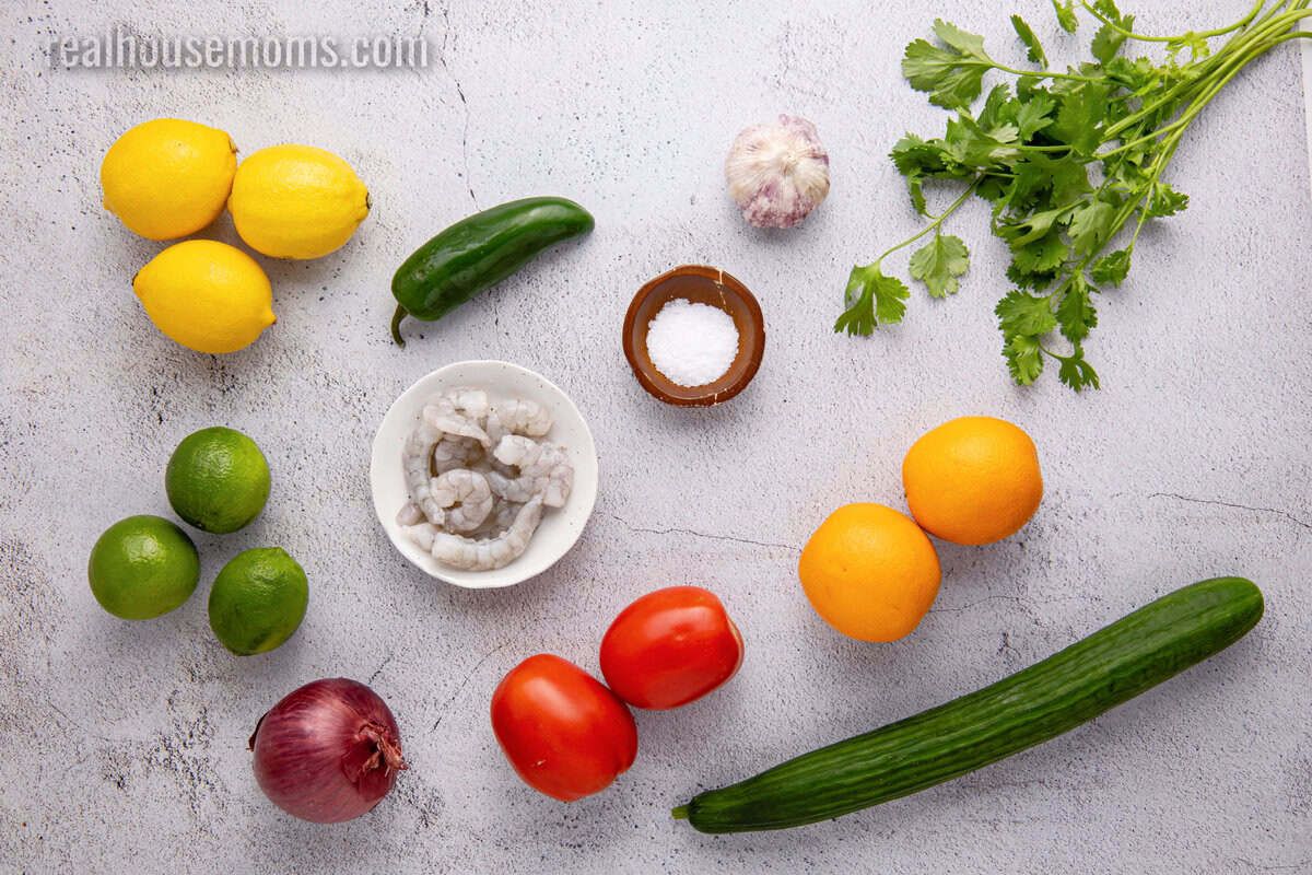 ingredients to make shrimp ceviche laid out on a counter