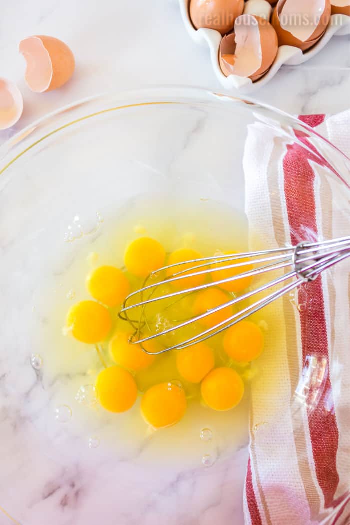 eggs in a bowl with a whisk