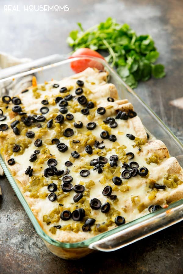 These Skinny Creamy Chicken Enchiladas are so full of flavor that no one will know that they're skinny! You can even make a double batch and freeze one for later. It's the perfect make-ahead family meal!