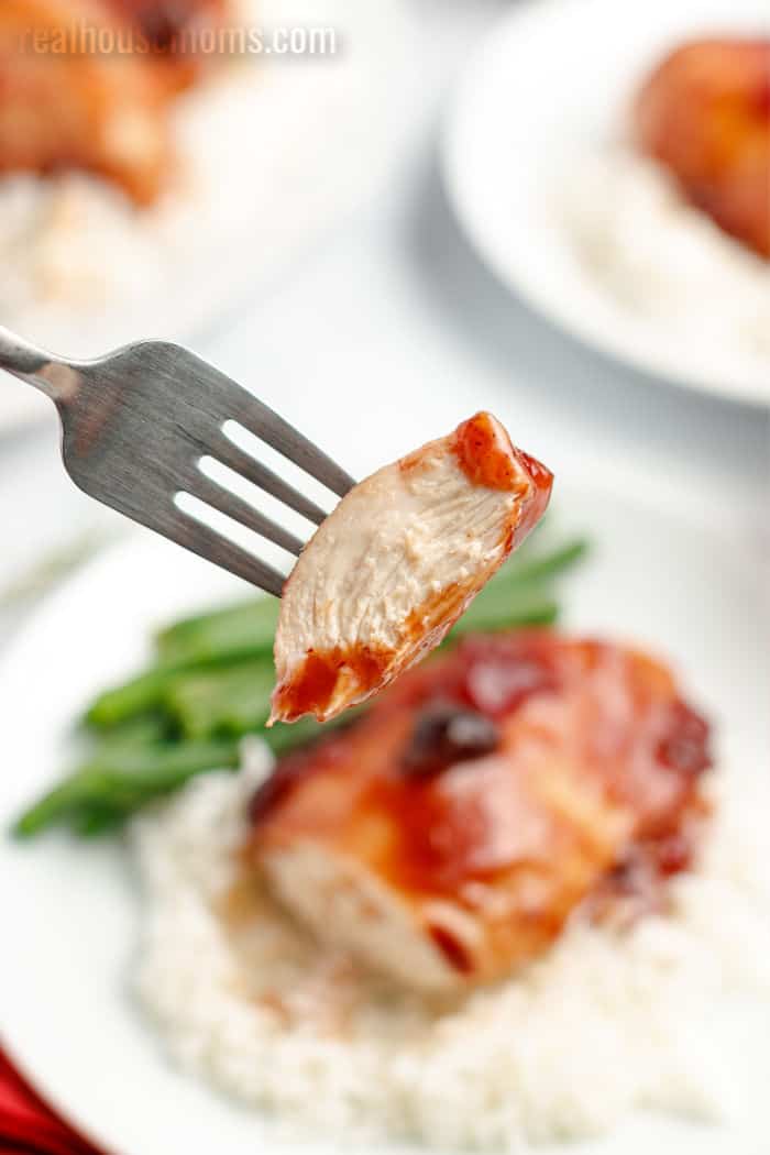 bite of cranberry chicken on a fork