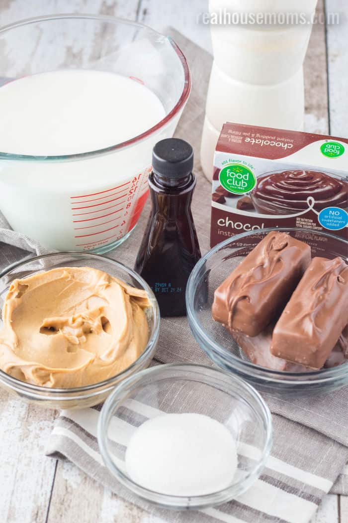 ingredients to make chocolate parfait with peanut butter mousse and candy bars