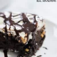 Snickers Poke Cake blew our minds. This dessert recipe is so easy to make the kids can even get in on the action! Add more chocolate to your life with this cake!
