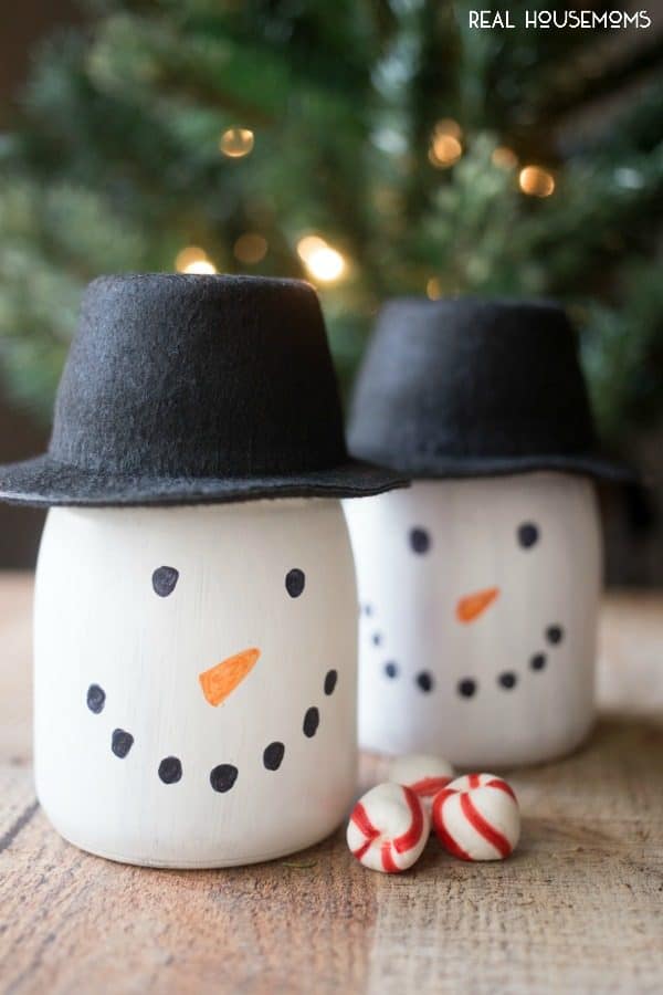 Perfect for Christmas crafting and gifting, create these adorable DIY Snowman Gift Jars!
