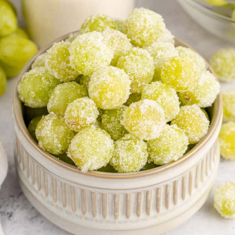 square image of sour patch grapes in a bowl