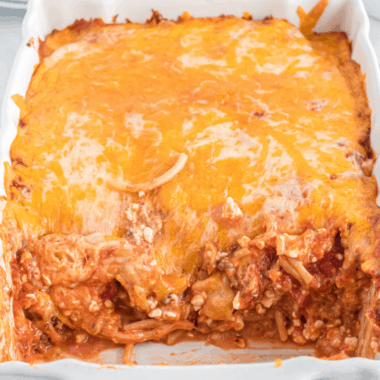 Comforting Spaghetti Casserole is a tried-and-true family favorite! Everyone loves this combination of creamy pasta, meaty sauce, and melty cheese!