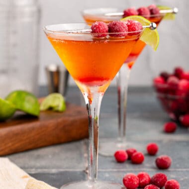 square image of two sparkling cranberry martinis
