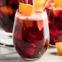 My Sparkling Red Wine Sangria Recipe is an easy make-ahead cocktail! Perfect for serving a crowd on any occasion & you can snack on when your drink's done!