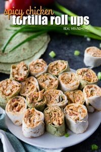 Spicy Chicken Tortilla Roll Ups are full of amazing flavors perfect for any party! These easy chicken pinwheels can be made ahead of time & served up later!
