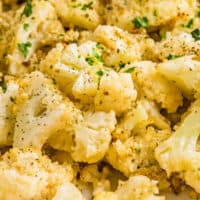 close up of spicy ranch cauliflower in a bowl with recipe name at bottom