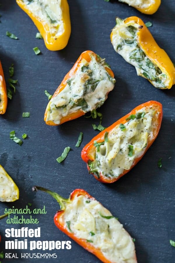 SPINACH & ARTICHOKE STUFFED MINI PEPPERS are little bites of summer goodness that will make you a star at your next picnic, potluck, or summer barbecue! 