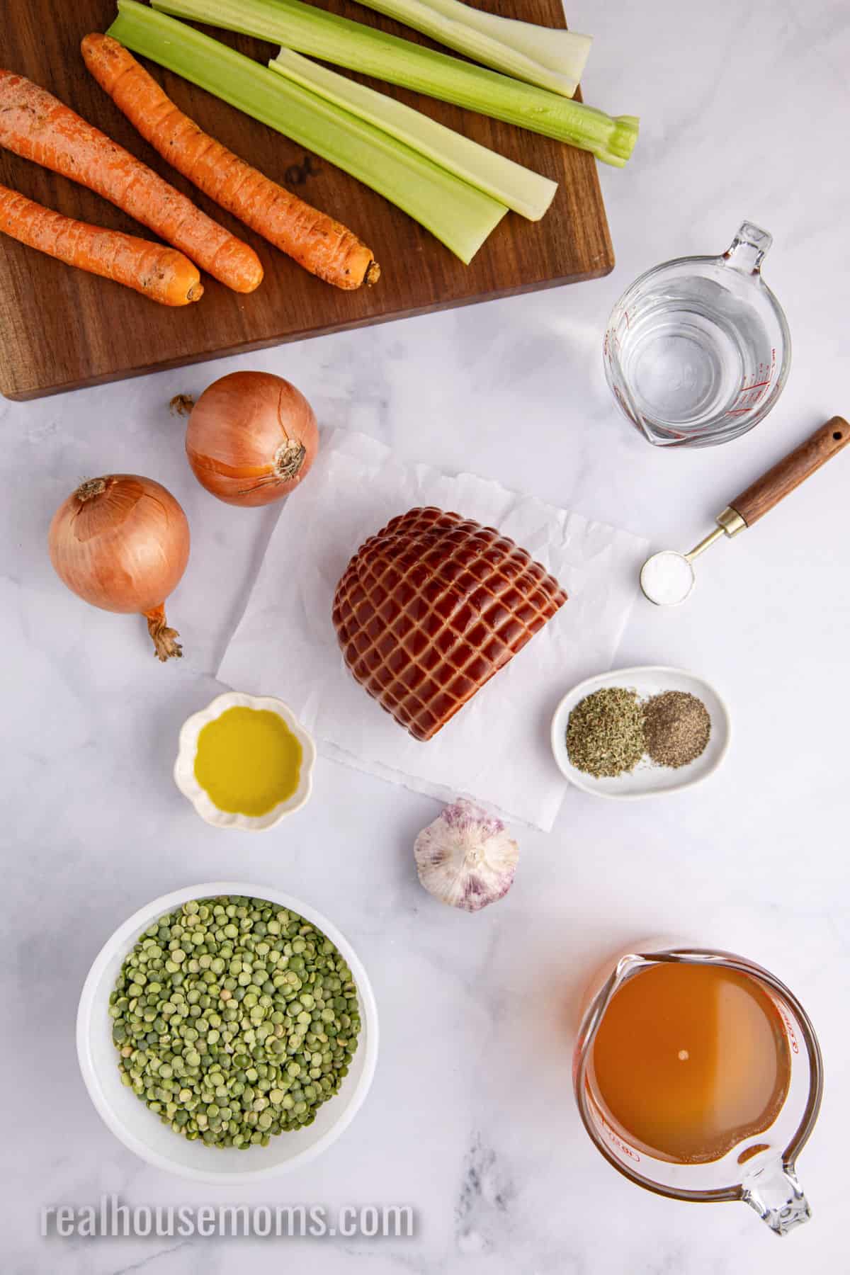 ingredients to make split pea soup laid out on a counter