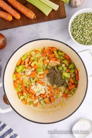 sautéed veggies, garlic, dried thyme, and pepper in a large pot