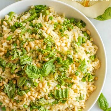 One-pot spring rice pilaf with asparagus and peas is a bright, fresh and easy side dish that’s topped with Parmesan cheese, fresh basil & pine nuts!