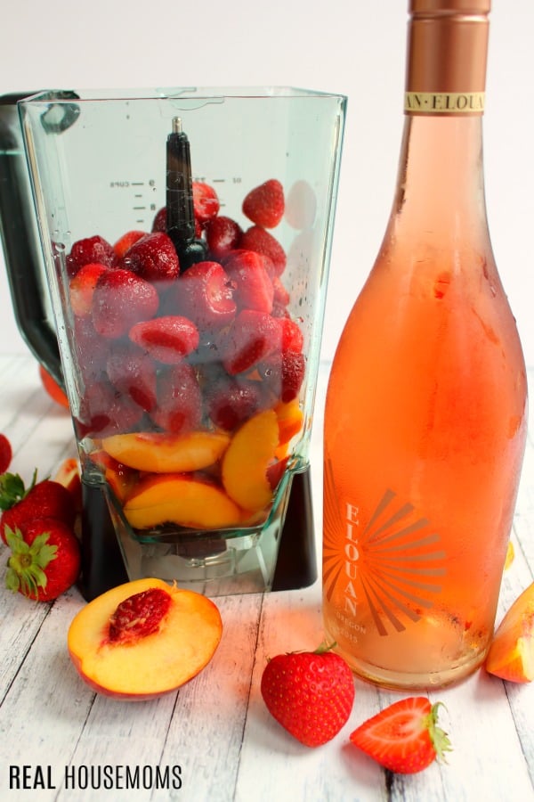 Ingredients to make Strawberry Peach Frosé in a blender