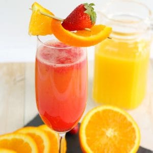 Need a new summer cocktail? This delicious Strawberry Tequila Sunrise is an amazing drink perfect for brunch with friends, happy hour, and parties too