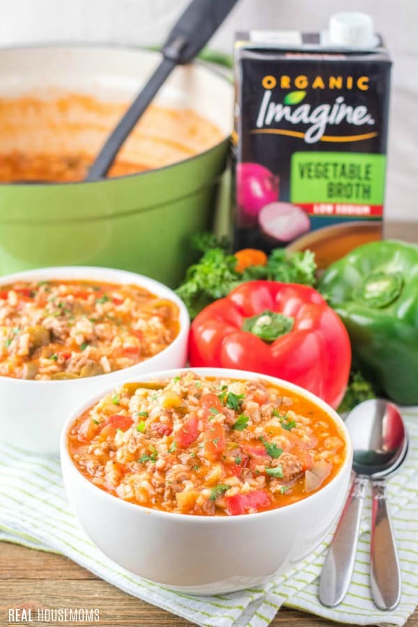 bowls of stuffed pepper soup with pot in background
