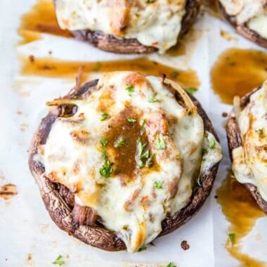 Stuffed Portobello Mushrooms with savory beef, sautéed onions, pepper jack cheese, and au jus are the most amazing low carb dinner!