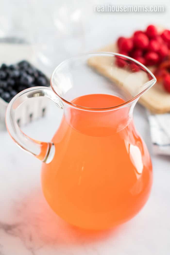 berry sangria in a pitcher without fruit