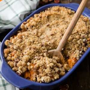 Easy Sweet Potato Casserole has creamy, spiced sweet potatoes topped with a pecan brown sugar streusel. It's the perfect side dish for any holiday meal!